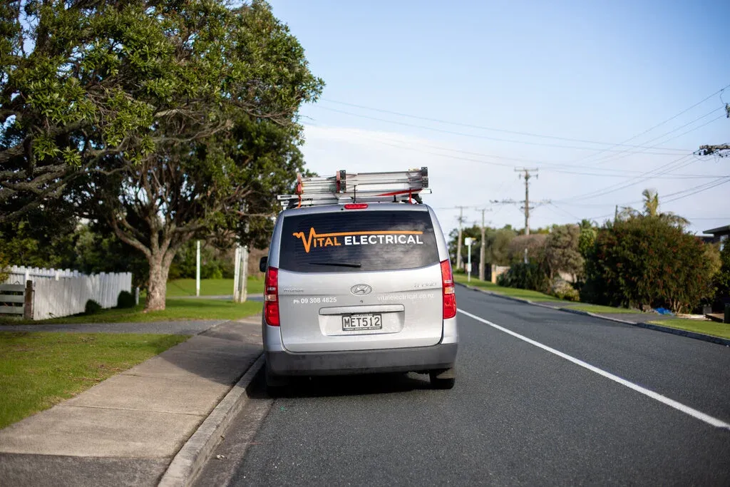 Vital Energy van driving through a West Auckland street